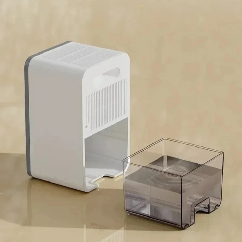 Portable dehumidifier with deodorising for damp and mould control in a bedroom or office