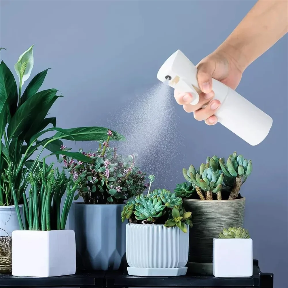 Continuous mist spray bottle, refillable fine mister for plants, hair and kitchen