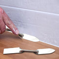 Double headed plastering trowel, stainless steel caulking and seam repair tool